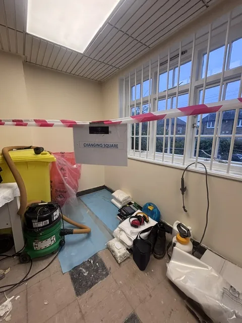 Asbestos floor tile and bitumen removal in Roehampton